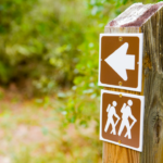 Hiking Trail Sign in a wooded park area