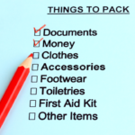 Packing tick box list with red pencil